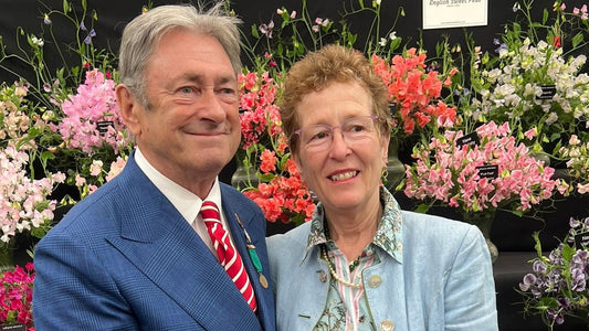 Rosy Hardy receiving the RHS Alan Bloom Award glassware from Alan Titchmarsh at the Chelsea Flower Show
